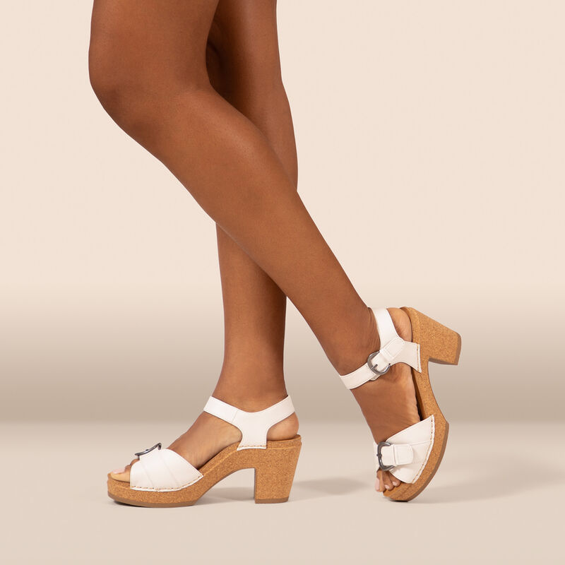 white open toe heels on foot